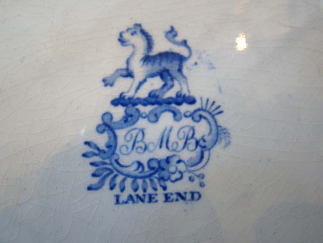 A large early 19rh century Blue Willow pattern serving platter by Lane End Pottery, circa 1830 — image 2